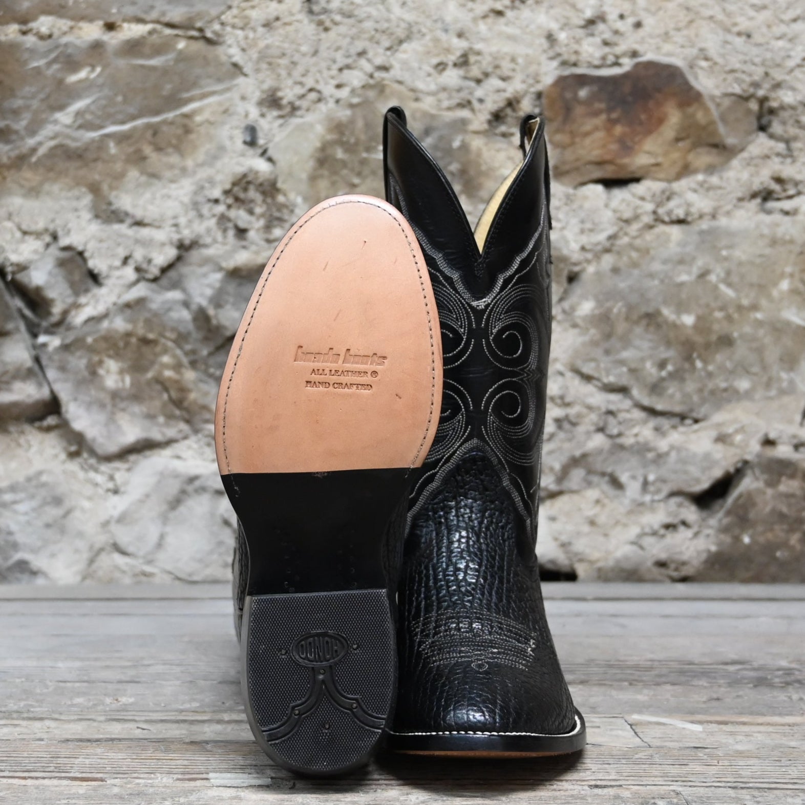 View of Hondo 13" all-black cowboy boot with bullhide vamp, medium round toe, and pull straps