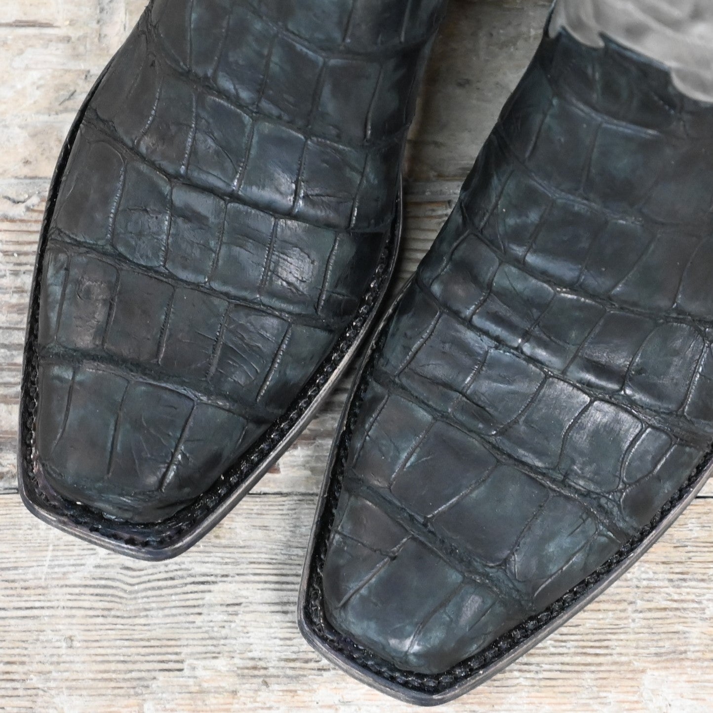 Lucchese men’s 13-inch boot in black giant American alligator leather with distressed finish and square toe