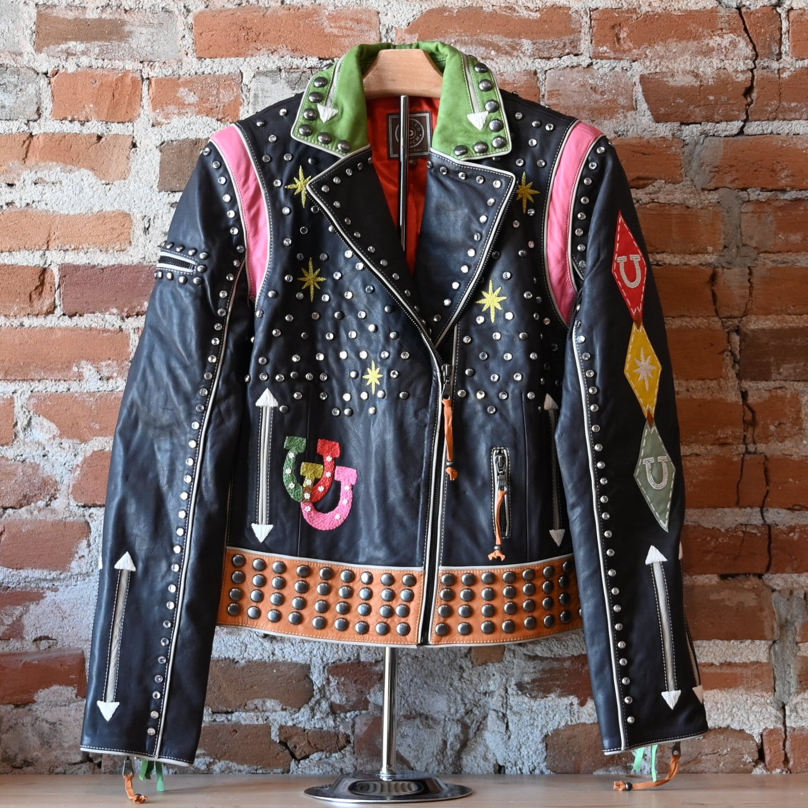 Double D Ranch Atomic Ranch bronco brown biker jacket with fringe, studs, crystals, and starburst embroidery