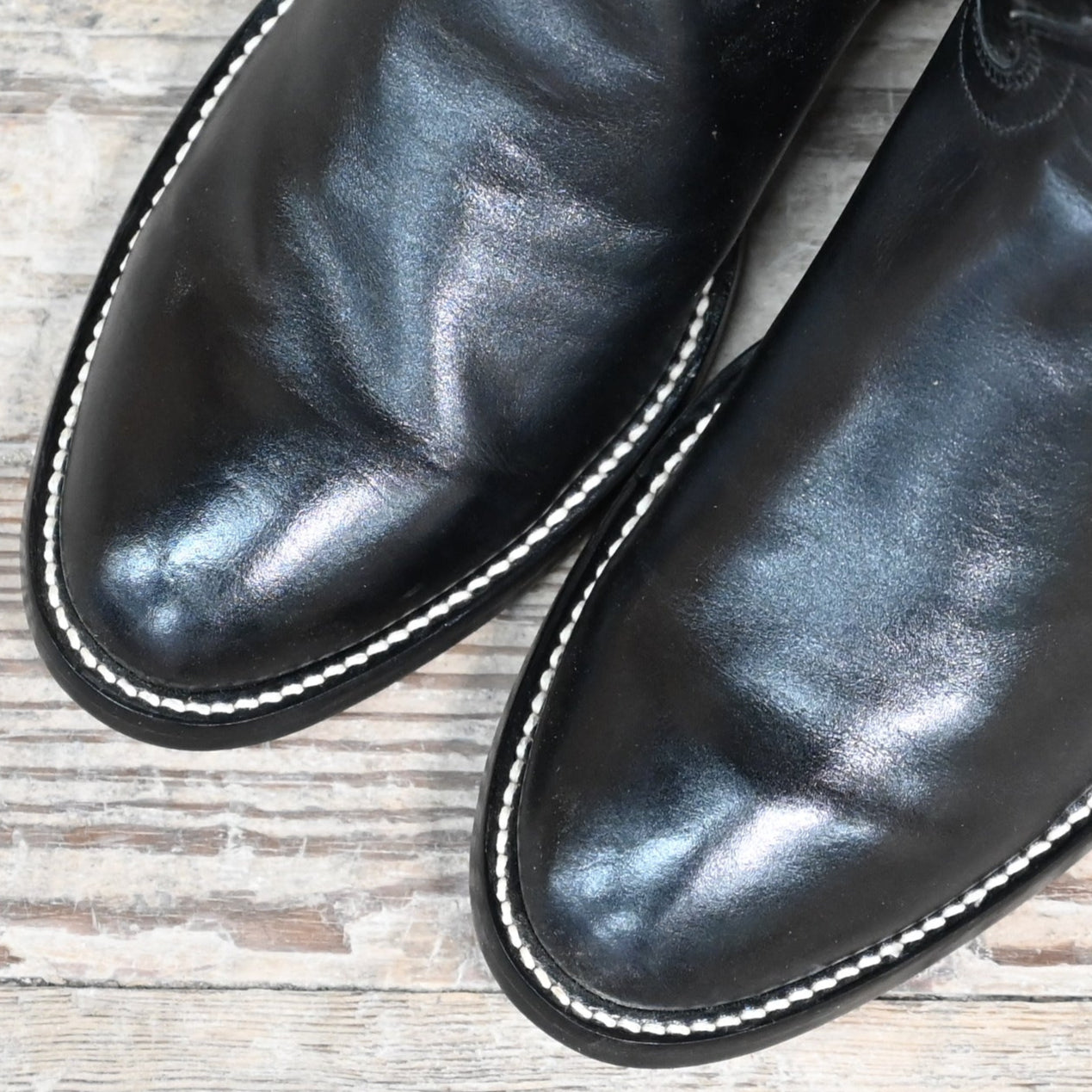 View of Hondo black cowboy boot with medium round toe, 11" top, and pull straps