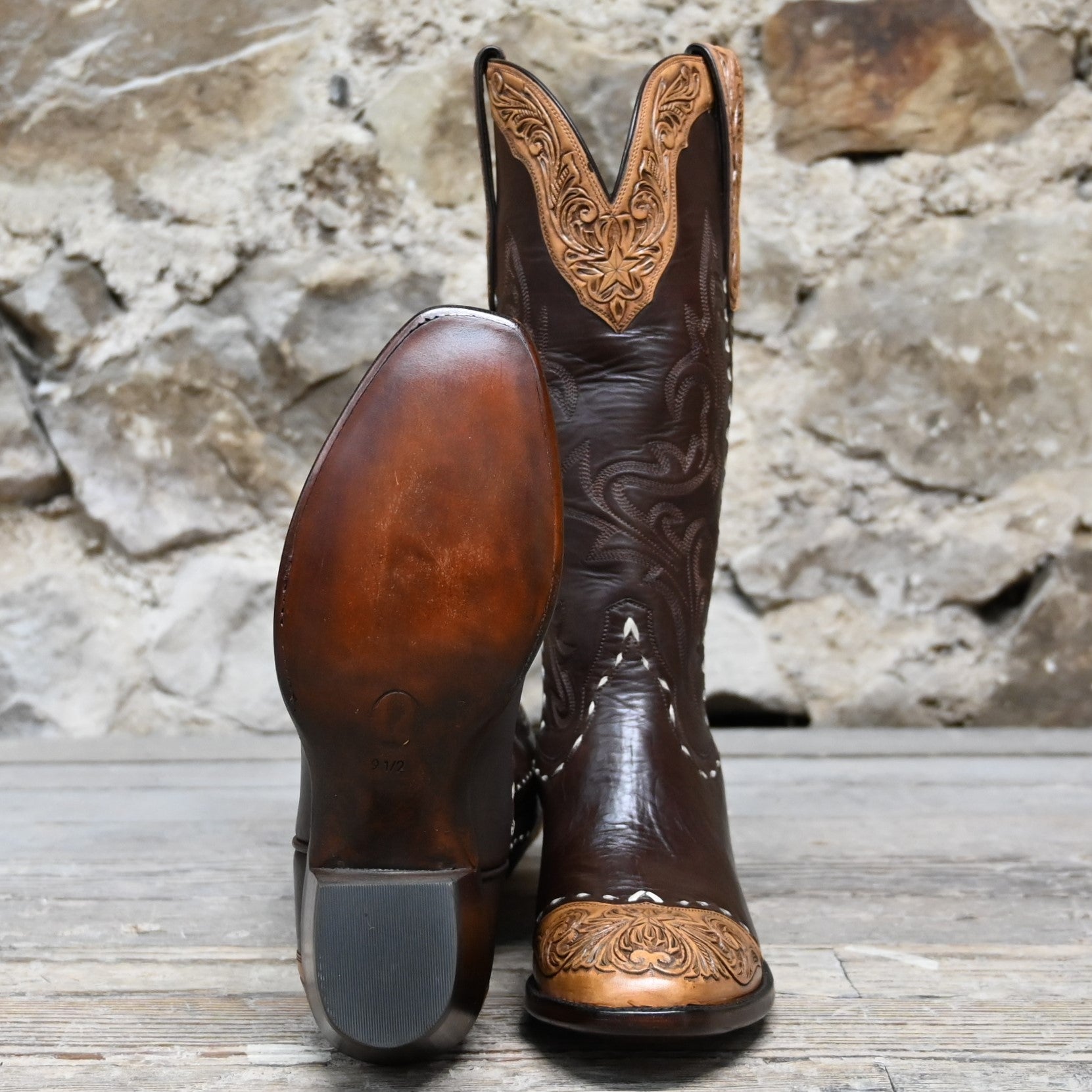 View of Stallion Ladies 14" chocolate cowhide boot with floral tooled top and bone buckstitching