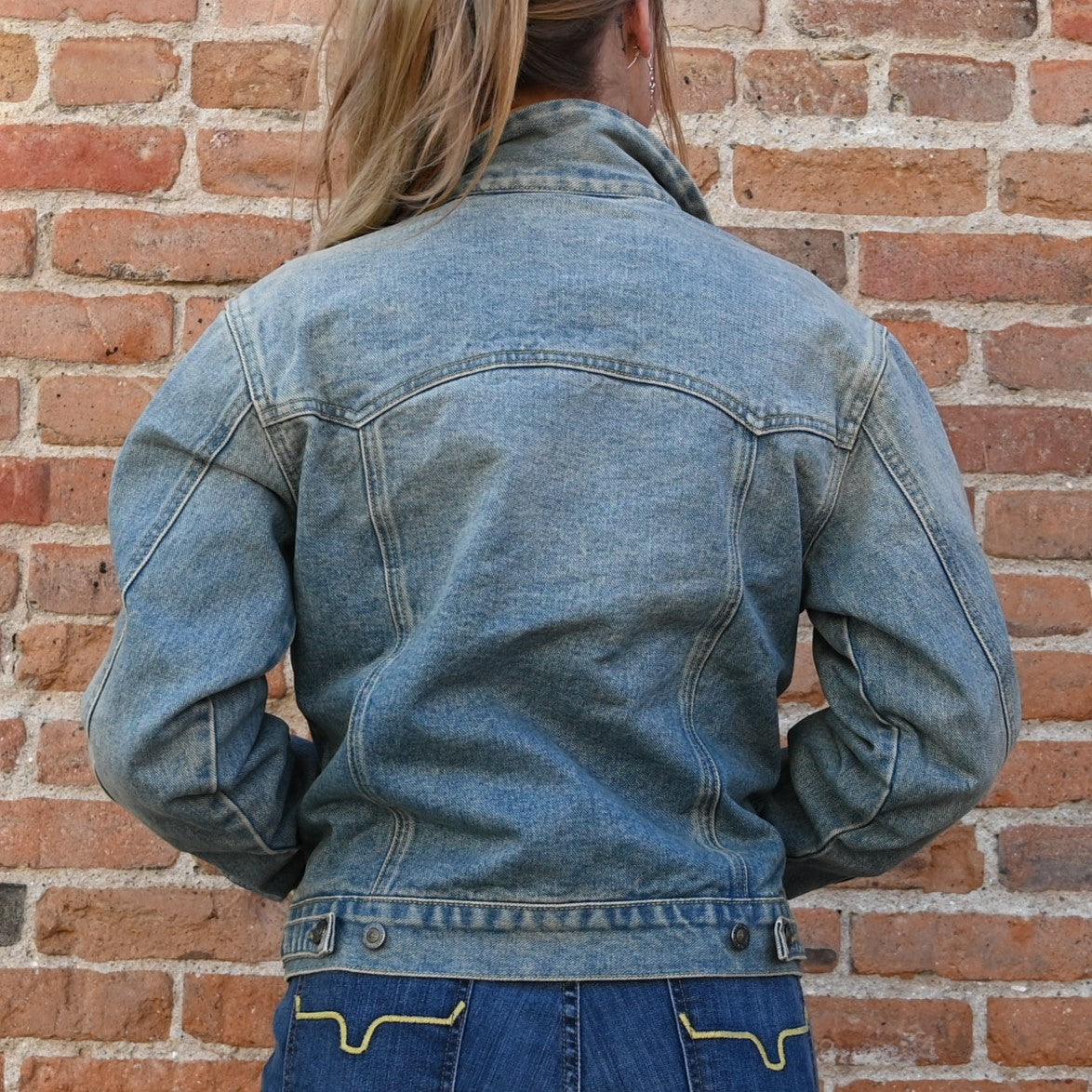 View of Schaefer ladies vintage-wash denim jacket with leather collar and flannel-lined sleeves