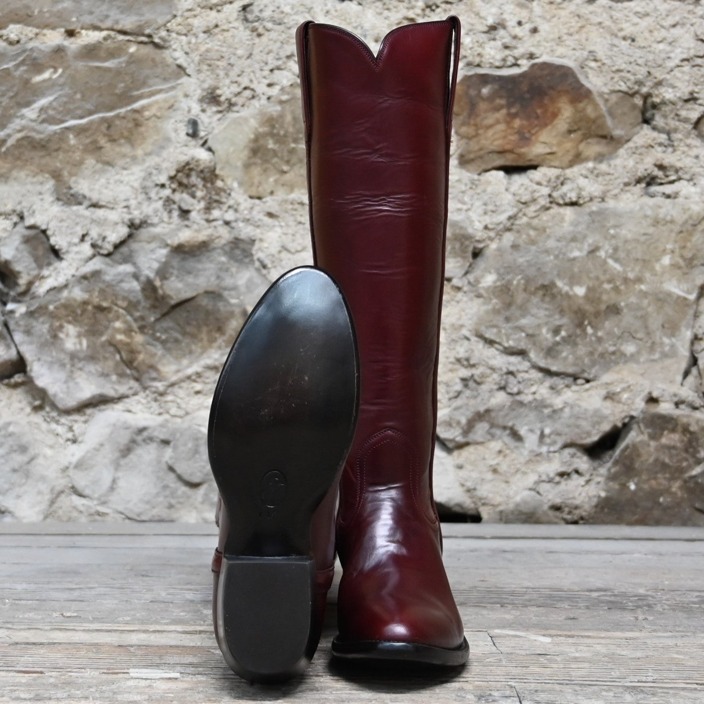 View of Stallion Ladies 16" Burnt Red Calf English High Boot with B toe and covered piping