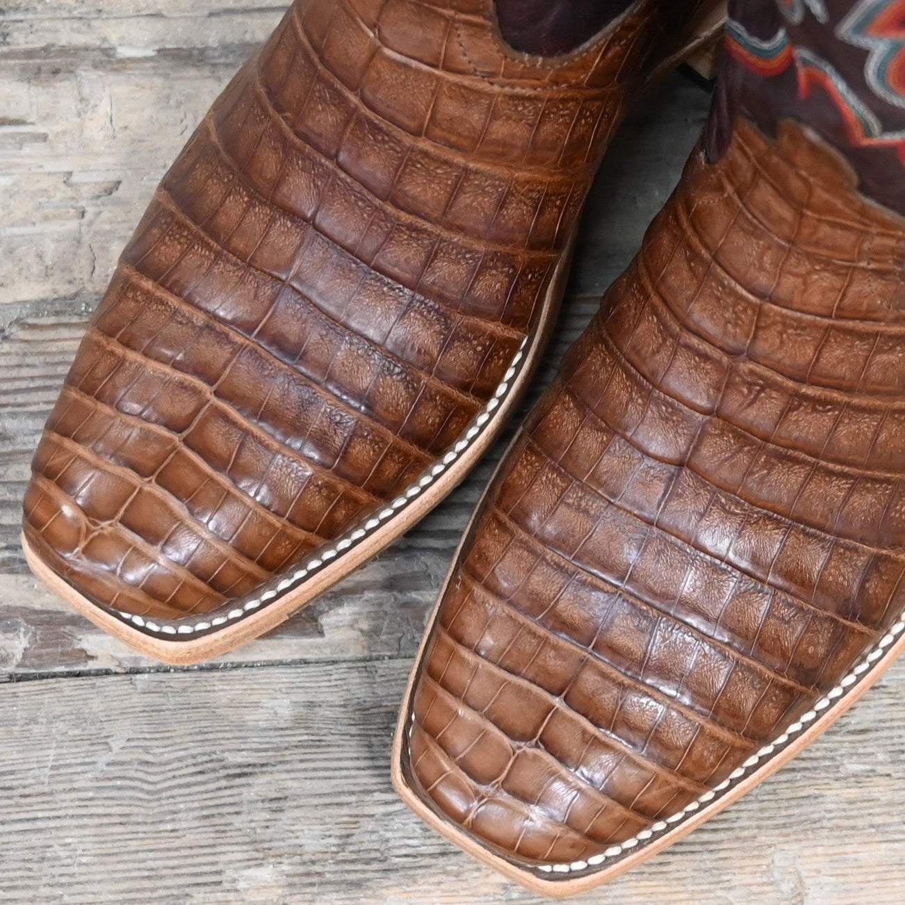 View of Horse Power 13" boot with black caiman belly vamp, black glove top, cutter toe, and pull straps