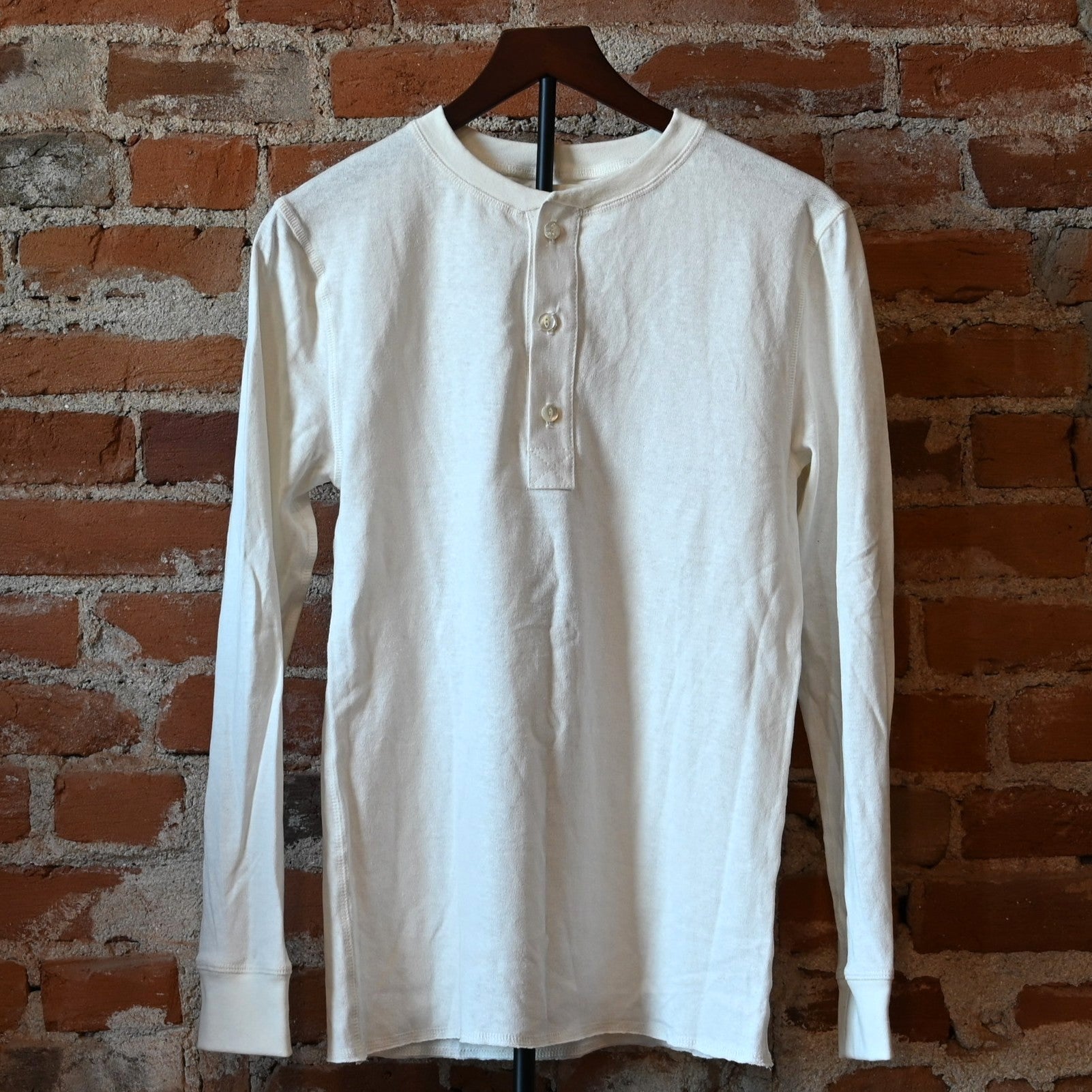Howl Intentional Goods Unisex Quetico Henley in natural hemp and cotton blend with mother-of-pearl buttons