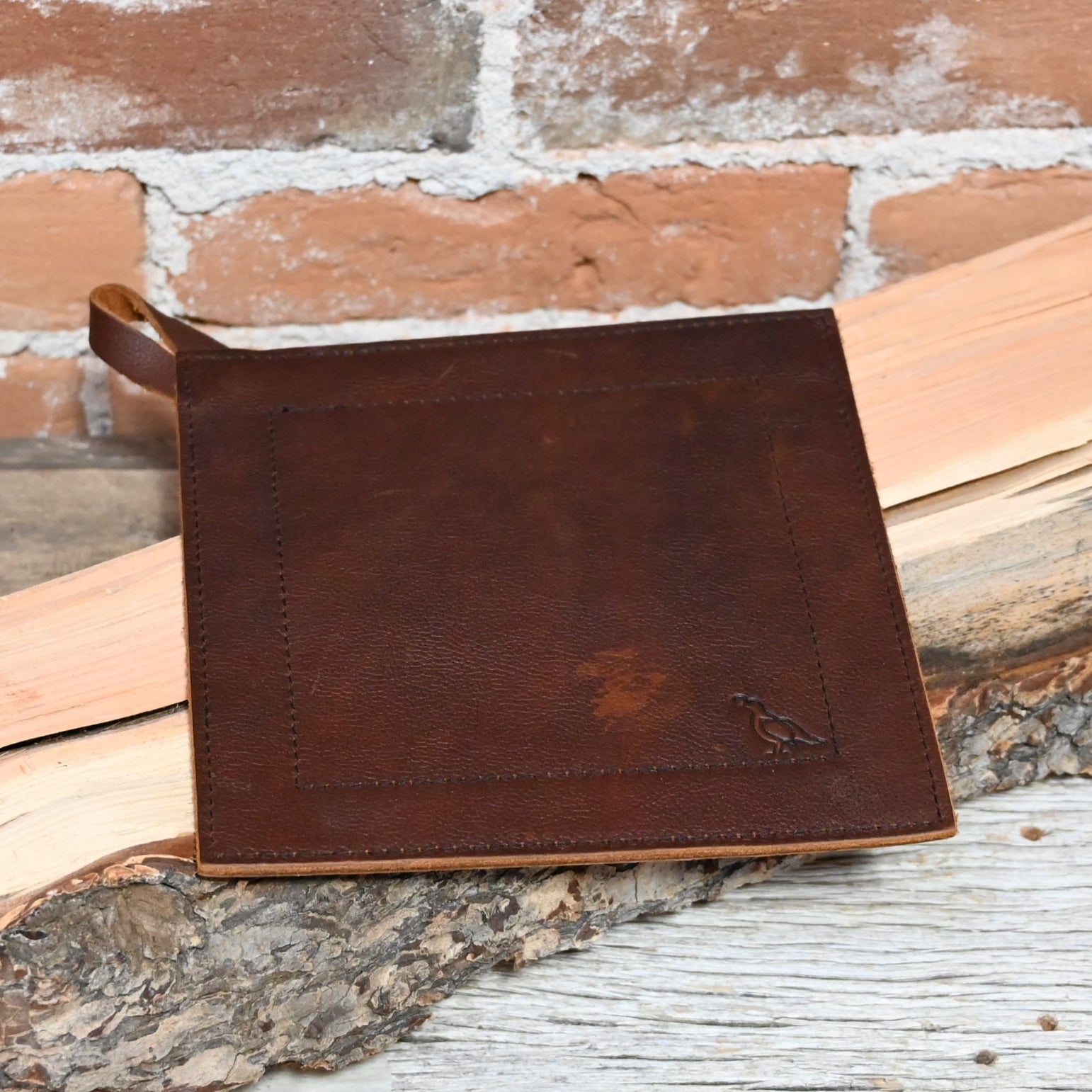 View of Smithey Full Grain Leather Potholder – Handcrafted heat-resistant accessory for secure handling of hot cookware