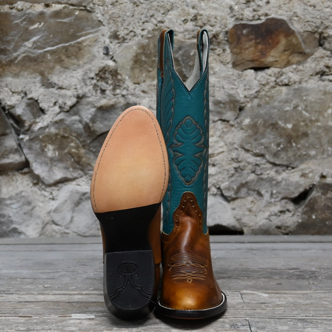 View of Hondo 14" cowboy boot with turquoise top, tan waxy cowhide vamp, and tight round toe