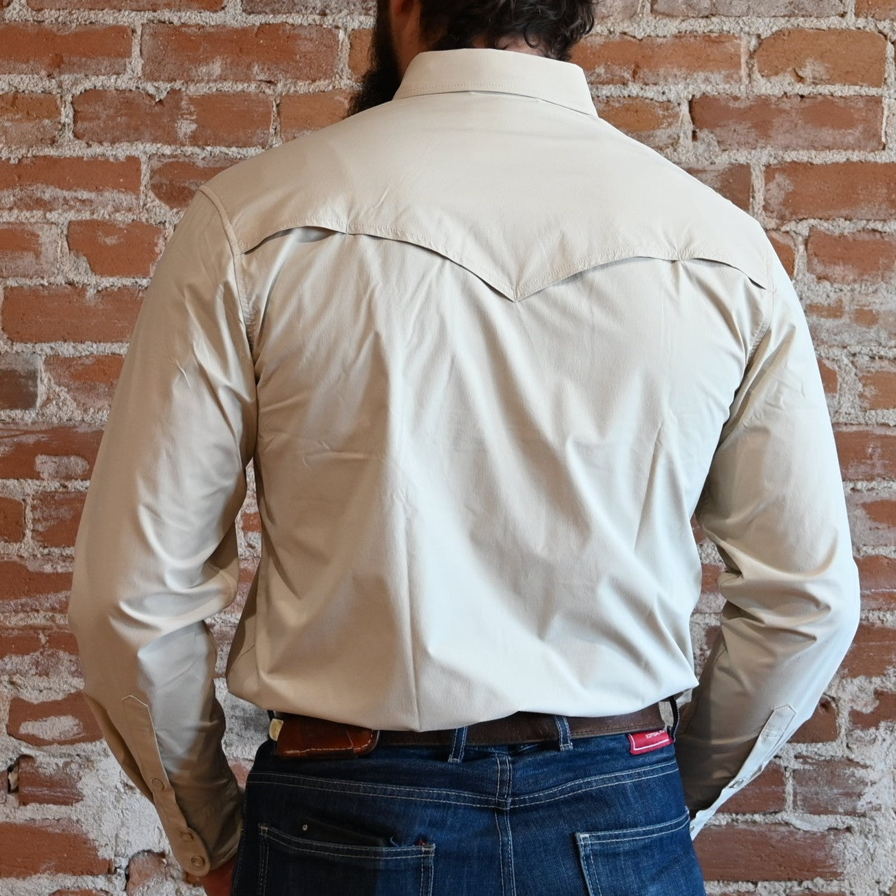 View of Schaefer khaki RangeTek Western snap shirt with mesh back vent and fleece-lined chest pockets