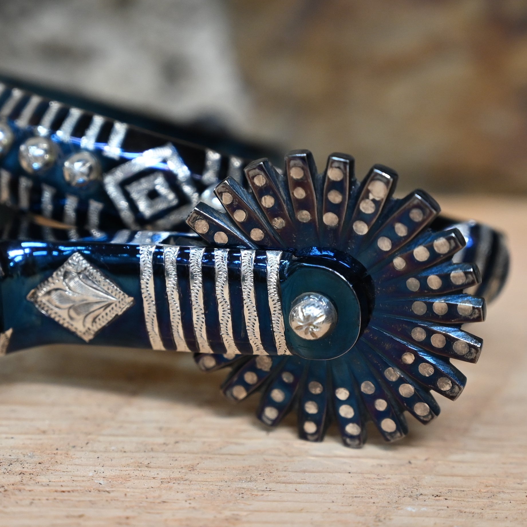 Double Mounted Blued Spurs view of close up