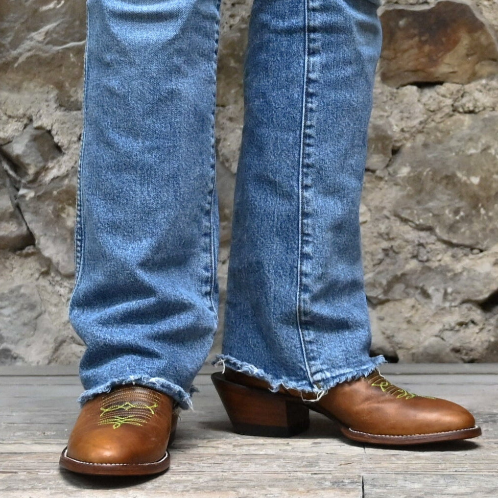 View of Hondo 16" cowboy boot with lime crater top, tan waxy vamp, pull holes, and spur ledge