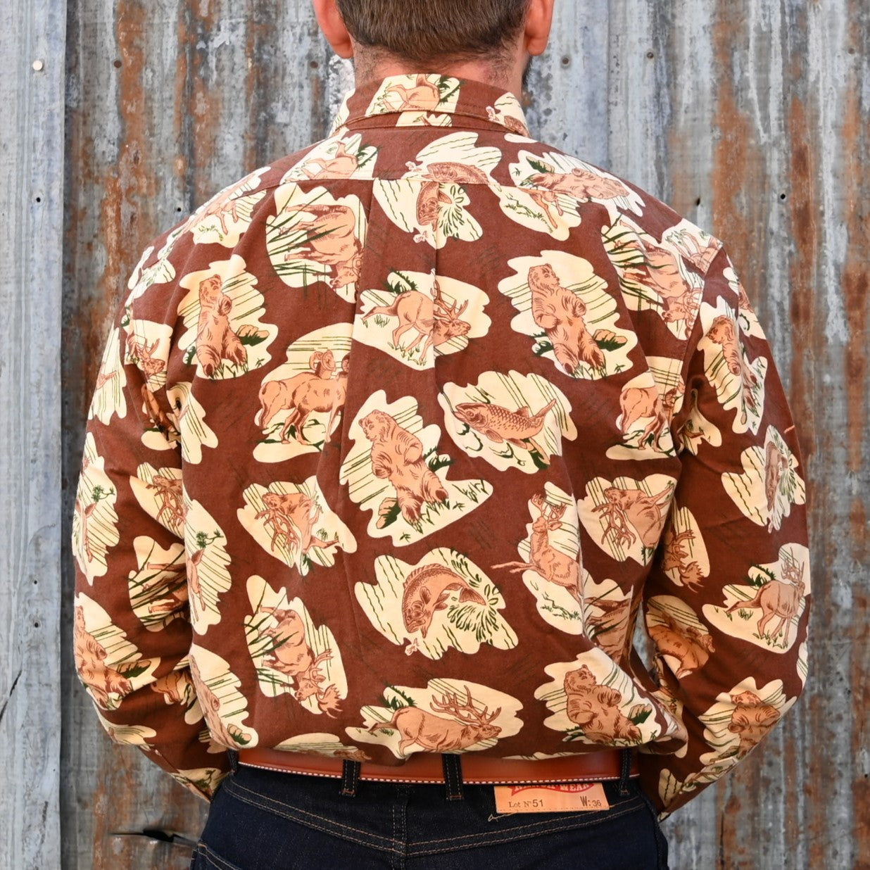 View of Filson Field Flannel Shirt featuring button-close chest pockets and adjustable cuffs