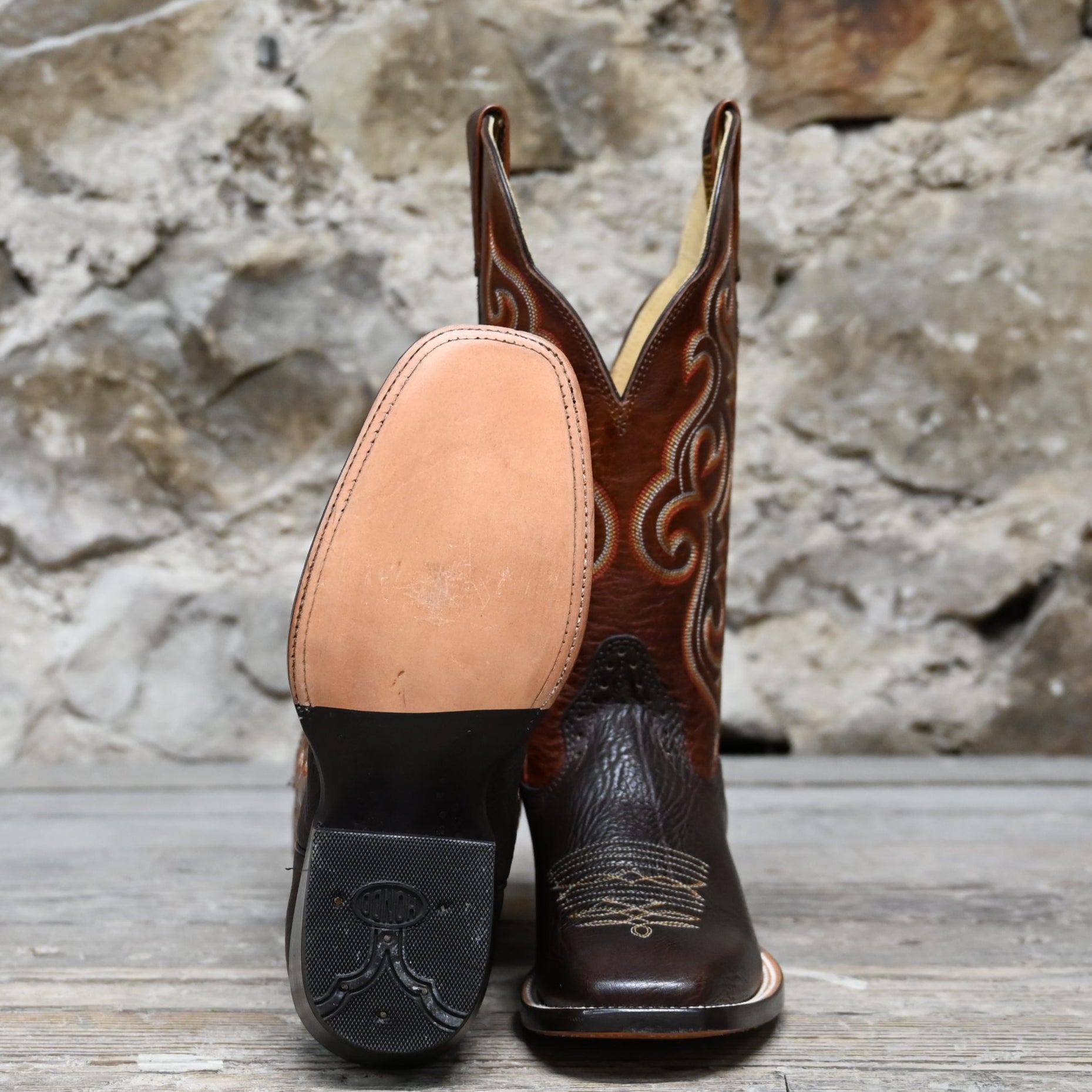 View of Hondo 13" cowboy boot with rust volcano top, chocolate shoulder vamp, and medium square toe