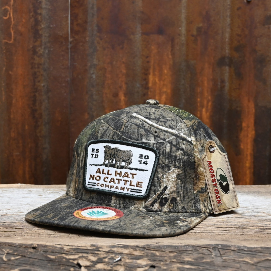 View of Sendero “All Hat No Cattle” Hat with full Mossy Oak camo and embroidered patch