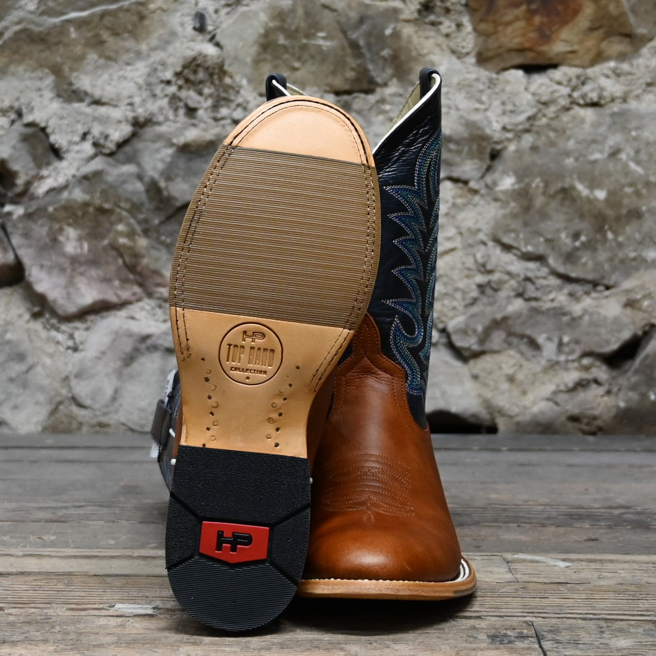 View of Horse Power 11" boot with navy goat top, cognac Belton vamp, medium round toe, and pull straps