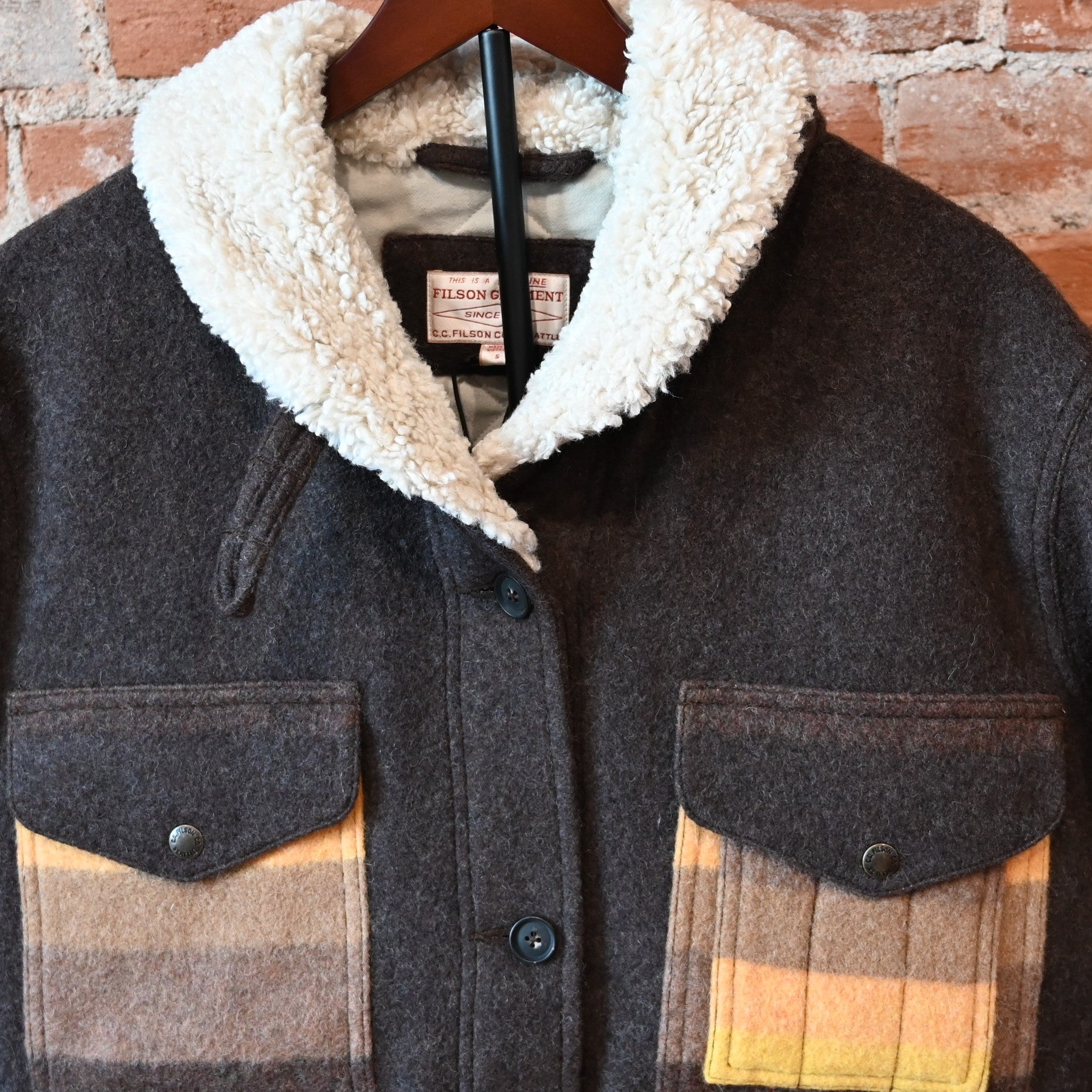 Filson Ladies Kodiak Shawl Collar Coat in Brown and Yellow Stripe with fleece-lined collar and cargo pockets