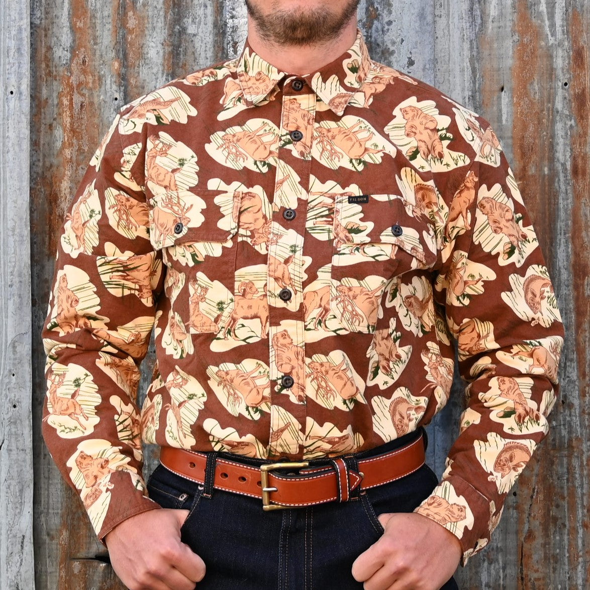 View of Filson Field Flannel Shirt featuring button-close chest pockets and adjustable cuffs