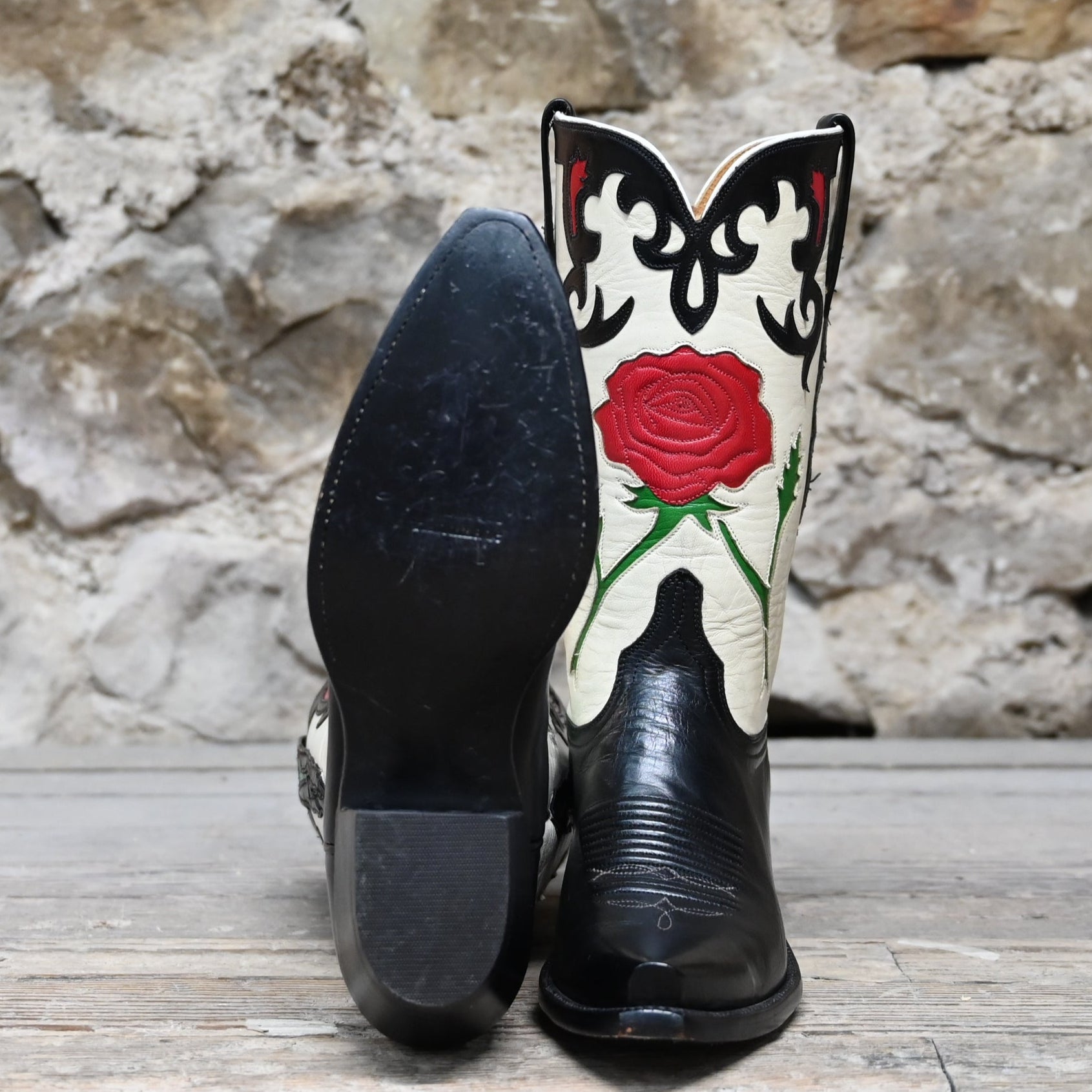 View of Lucchese ladies 13″ boot in black and wheat with red rose inlay and vintage collar