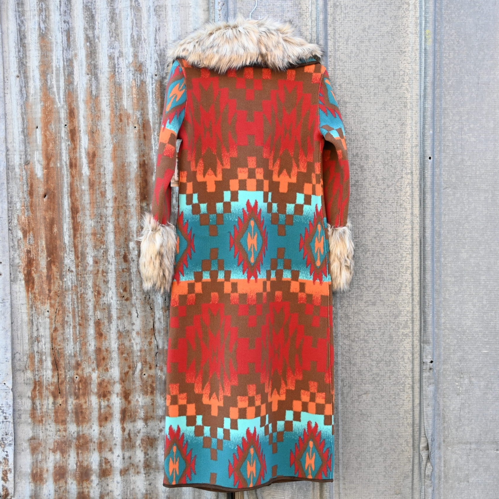 Tasha Polizzi Casey Coat in geometric orange, red, turquoise, and brown wool with removable faux fur collar and cuffs