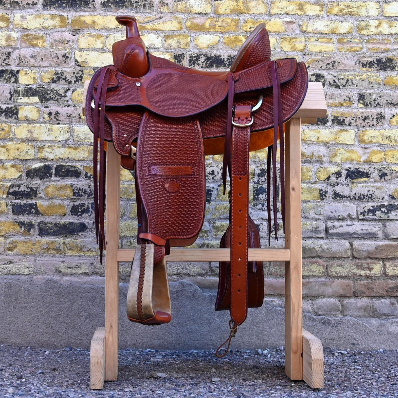 View of Billy Cook 15½" High Country Rancher Saddle in Chestnut with hand-stamped basket tooling