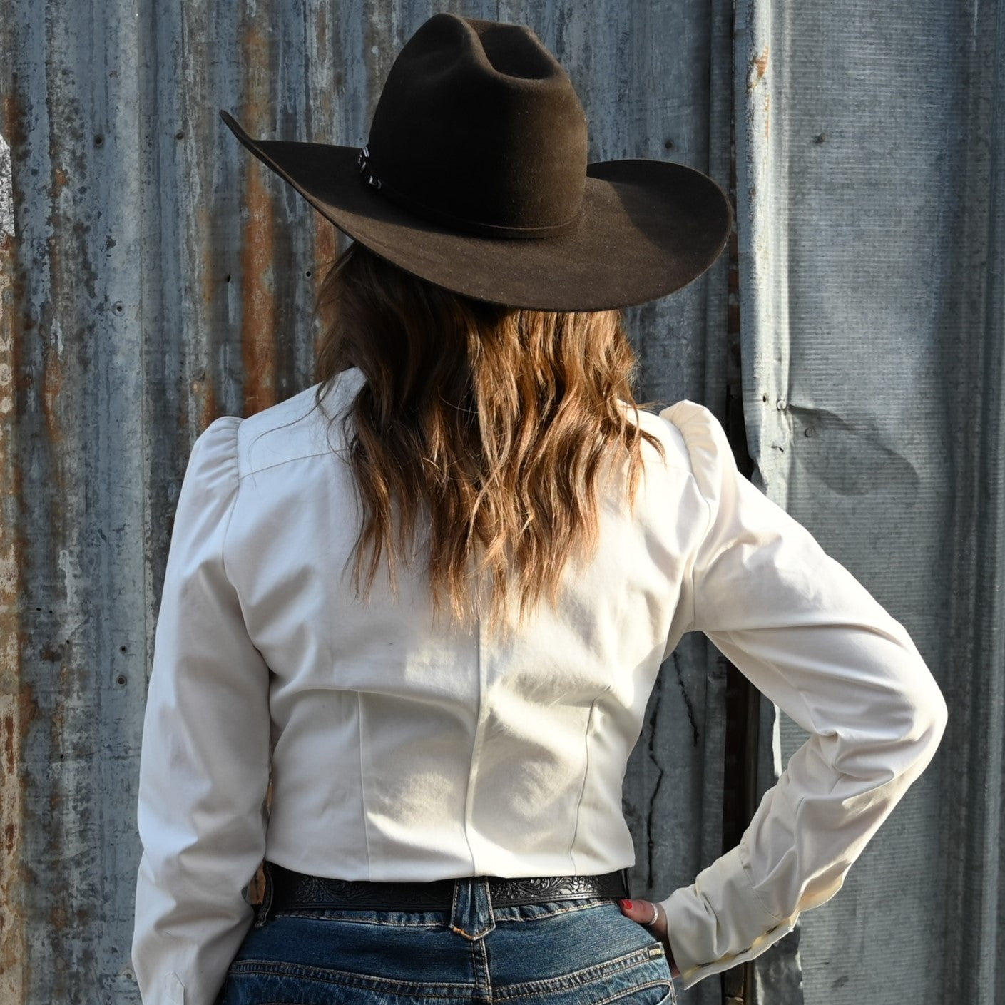 View of Blue Blanket ladies white Western cotton shirt with turquoise gem snaps and yoke detailing