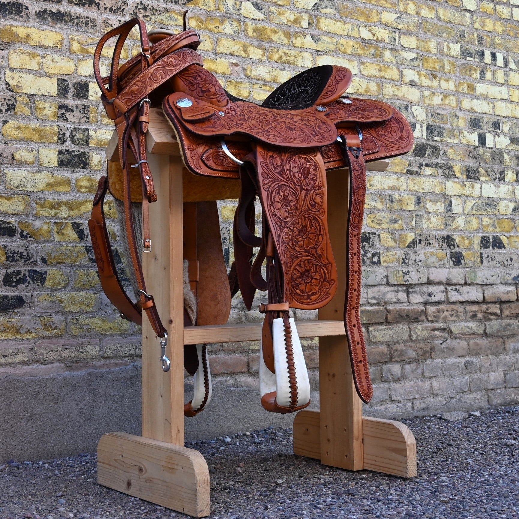 View of Billy Cook Fully Tooled Roper Saddle with Bridle, Breast Collar, and Reins