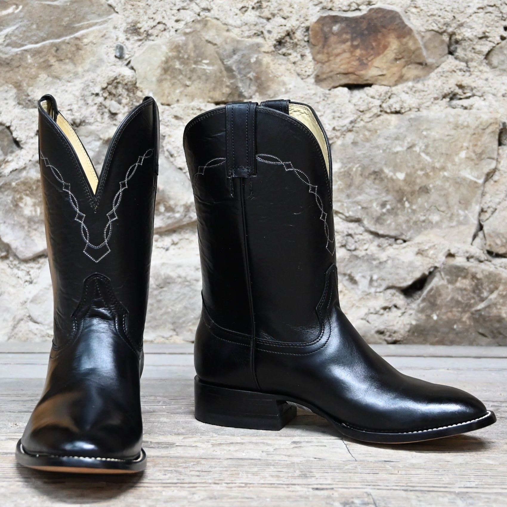 View of Hondo black cowboy boot with medium round toe, 11" top, and pull straps