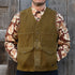 View of Filson Beartooth Cruiser Vest in Marsh Olive Blanket Stripe featuring snap-close front and reinforced pockets