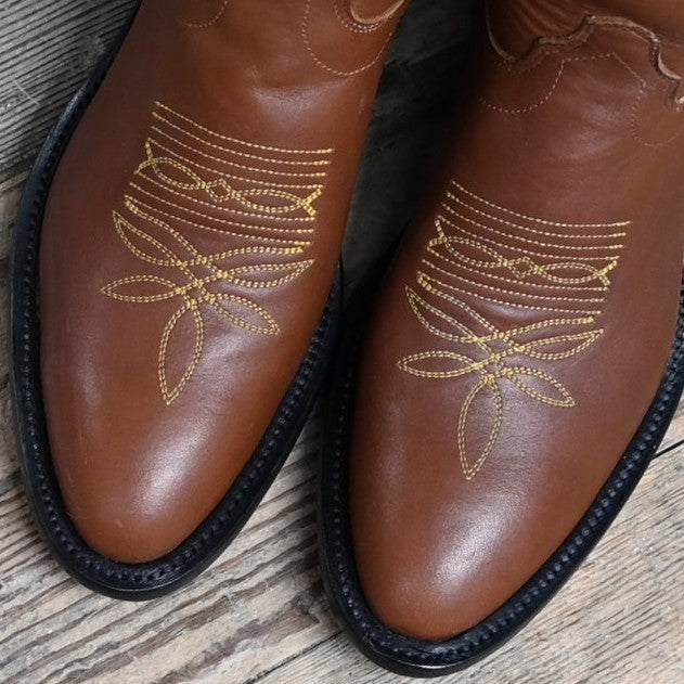 View of Toe Detail of Olathe 17" Tall Leather Polo Style Boot with Brown Mule Vamp and Roper Heel, and Yellow Toe Bug Stitching.