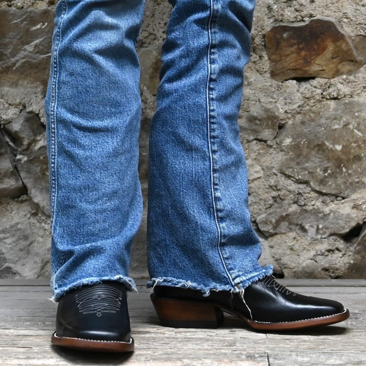 View of Hondo 11" cowboy boot with bone leather top, black steer vamp, and wide square toe