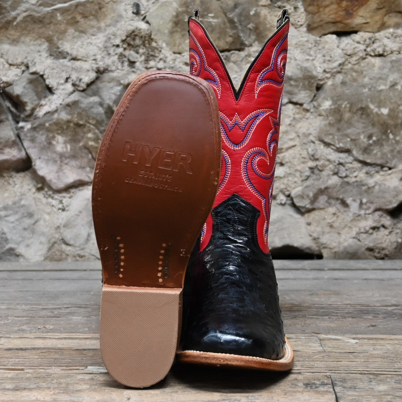 View of Hyer JETMORE 13" boots showcasing black full-quill ostrich vamp and red vintage goat upper with broad square toe and Stockman block heel