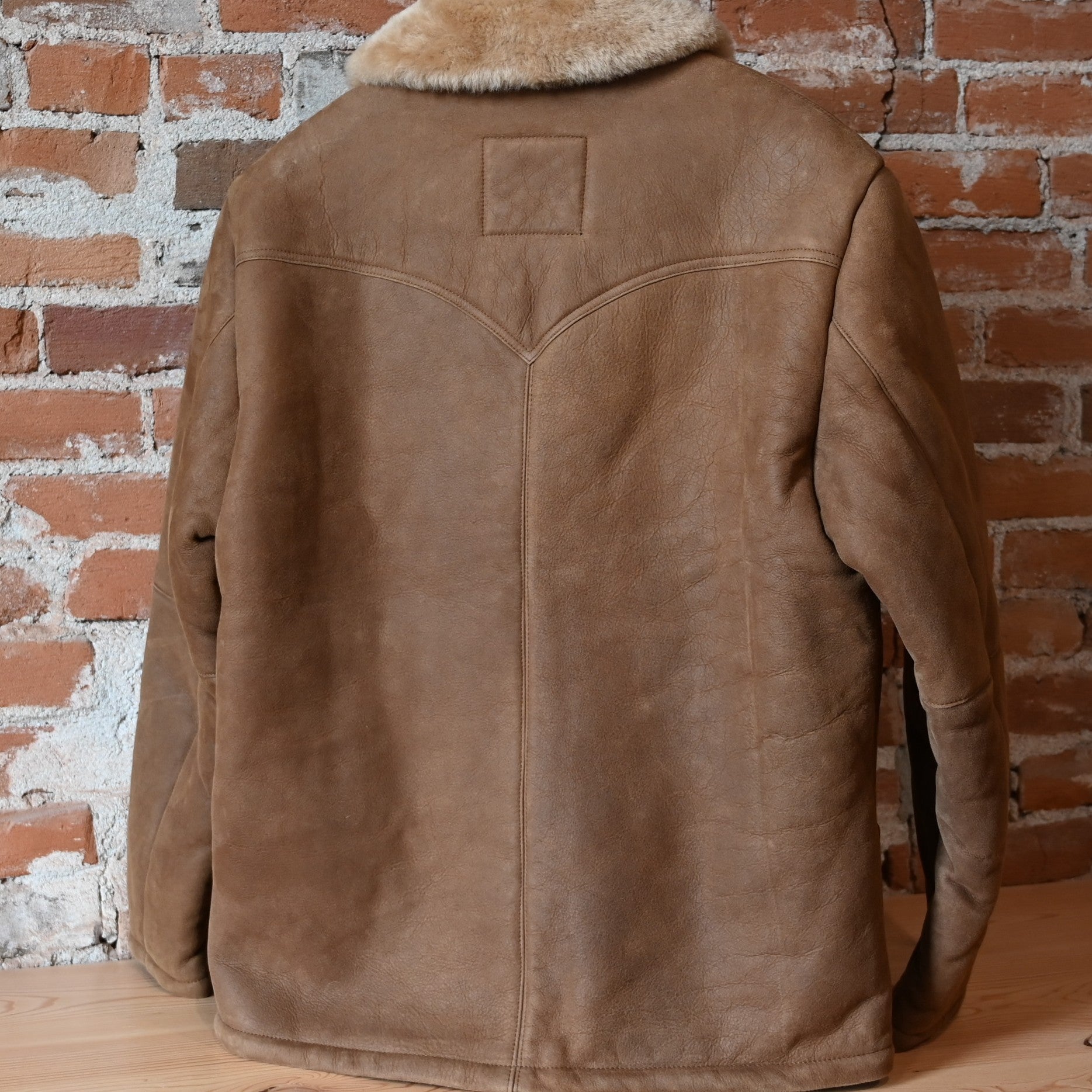 Schaefer brown shearling coat drop-in pockets lower hip length