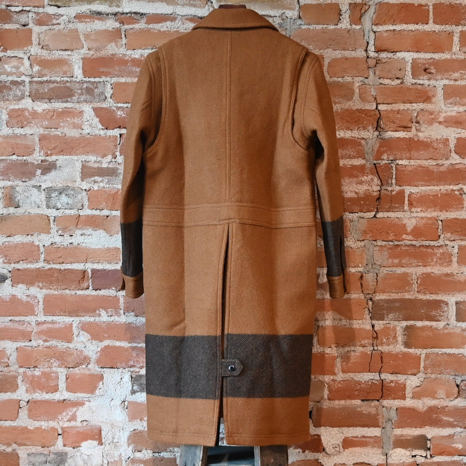 Filson Ladies Wool Long Cruiser Coat in Whiskey and Black Stripe with button front and cruiser pocket design