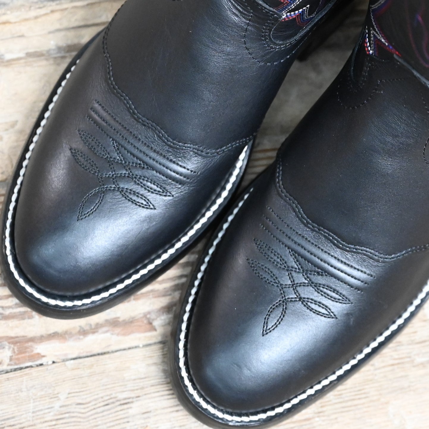 View of Hondo 14" black cowboy boot in retan leather with pull holes and spur ledge