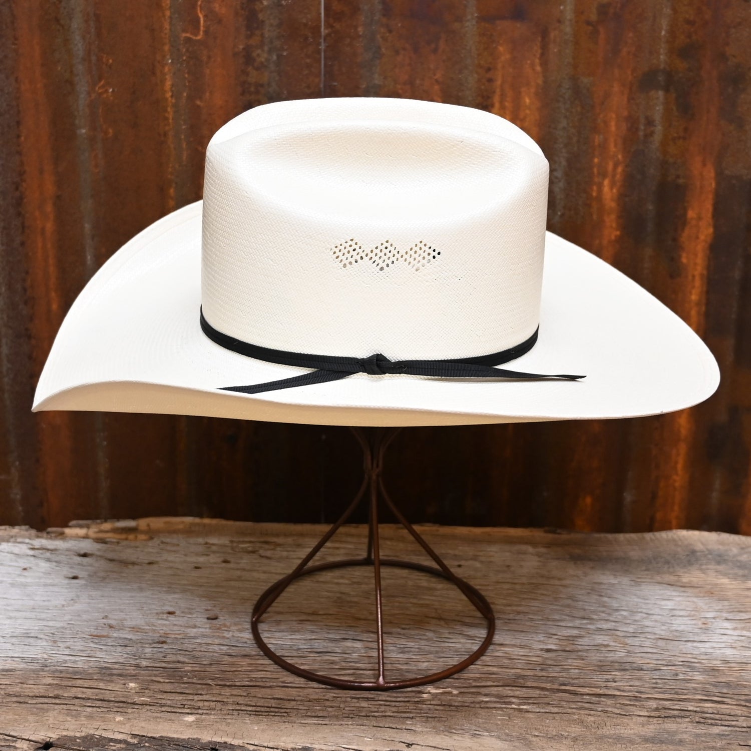 View of Stetson Campbell straw cowboy hat with vented Cattleman crown and leather hatband