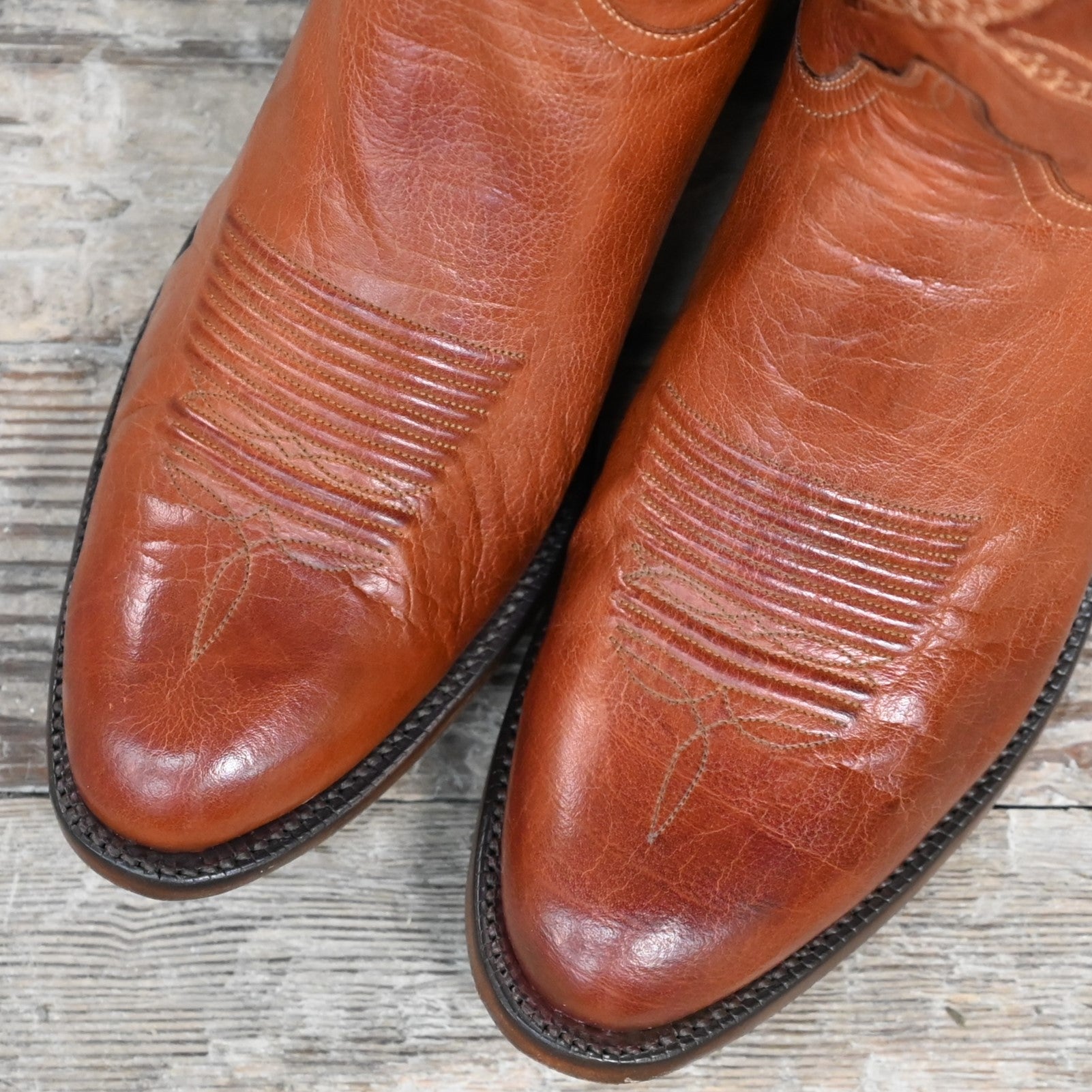 Lucchese Men’s 12-inch classic boot in cognac burnished buffalo calf leather with square toe and Western heel