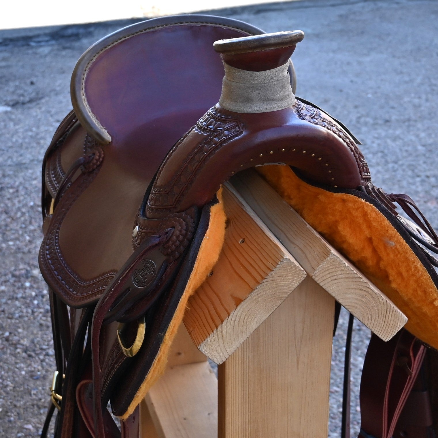 View of Billy Cook 15½" Arbuckle Wade Saddle with waffle border tooling and 7/8 in-skirt rigging
