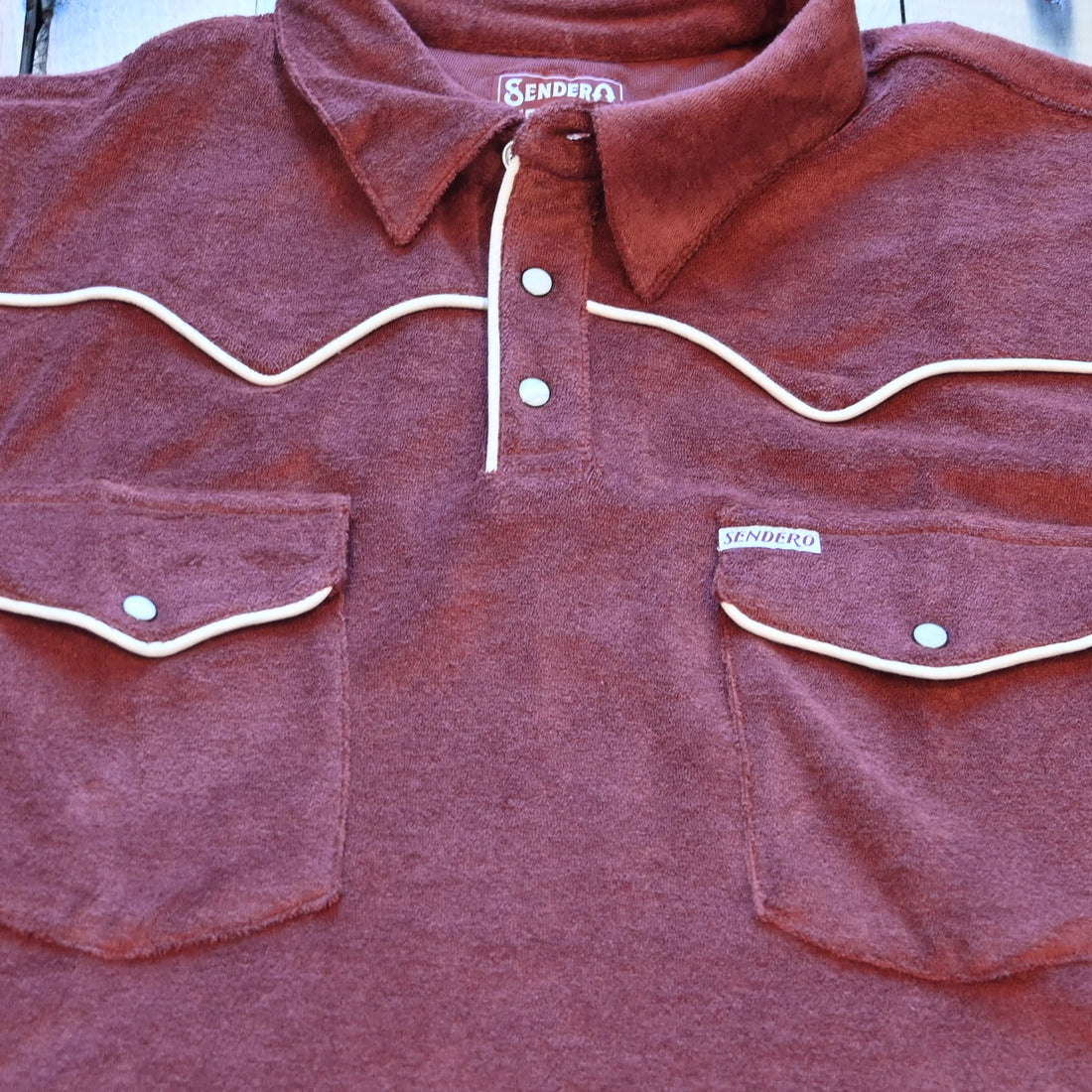 Mahogany Sendero Cantina Terry Polo with Western yokes, chest pockets, and pearl snap closure