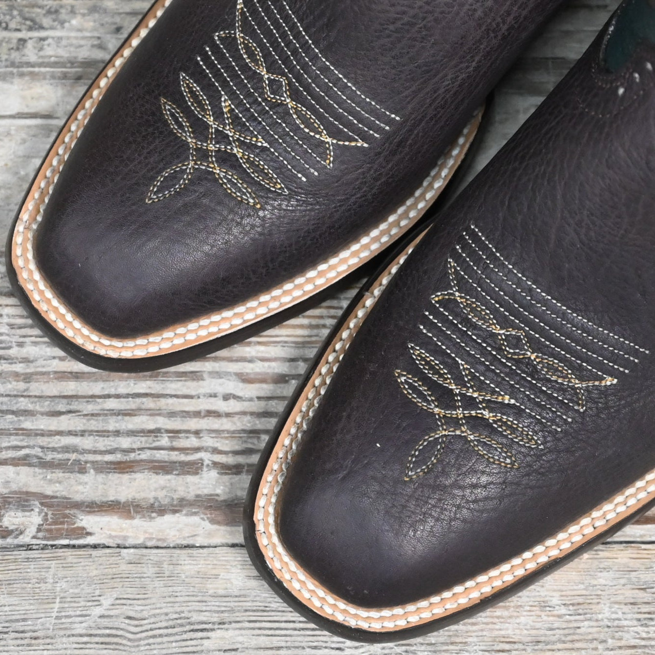 View of Hondo 13" cowboy boot with forest green top, cocoa pull up vamp, and tight French square toe