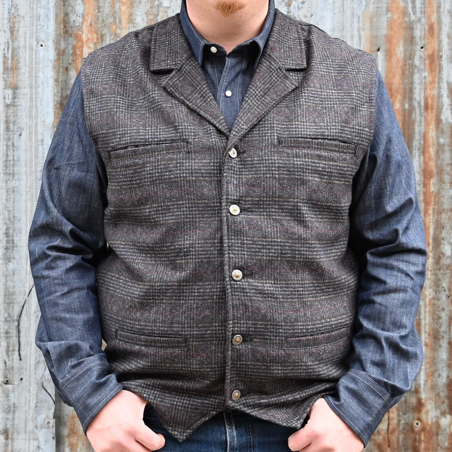 View of Schaefer Laramie vest in assorted wool-blend patterns with Western lapels and four-pocket design