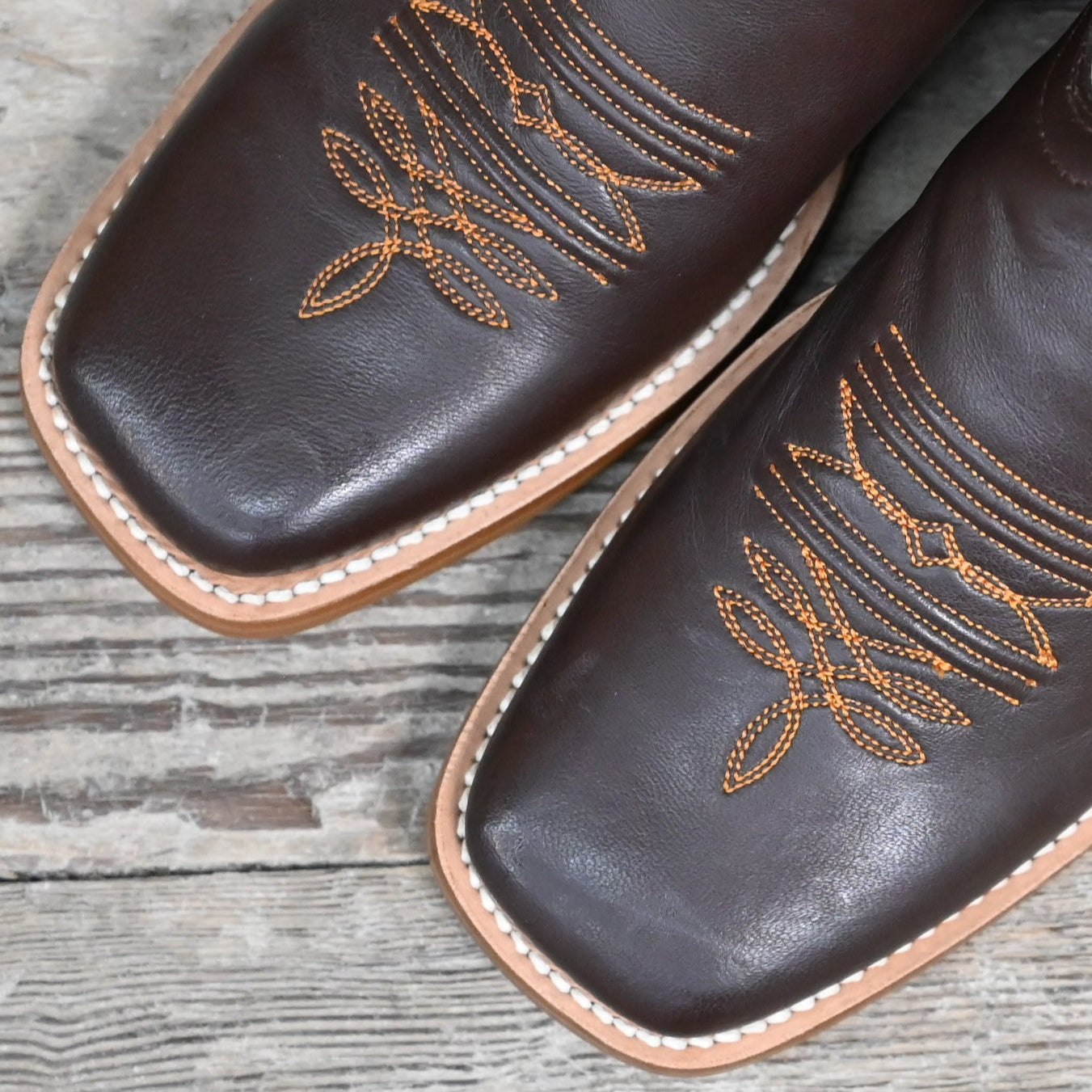 View of Hondo 11" cowboy boot with bone top, brown calf vamp, wide square toe, and pull straps