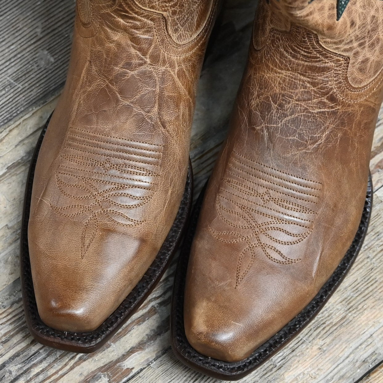 View of Hyer HUDSON 13" boots showcasing tan Mad Dog goat vamp and top with Forest goat overlay, Elite narrow square toe, and leather stacked heel
