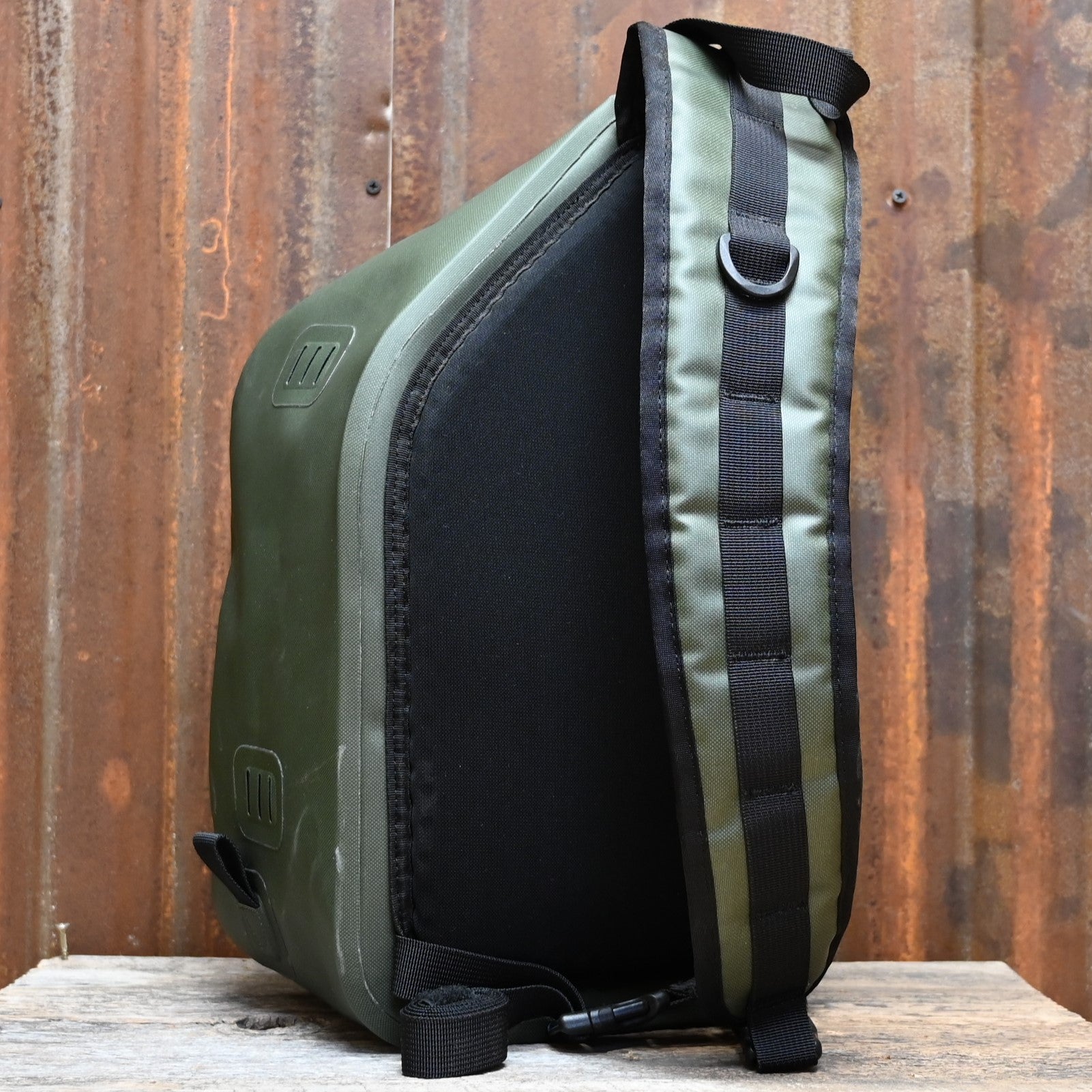 View of Filson Dry Sling Pack in Green featuring waterproof construction and ergonomic design