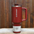 Stanley Quencher ProTour Flip Straw Tumbler 40 oz in Cranberry Gloss with flip straw lid and ergonomic comfort-grip handle