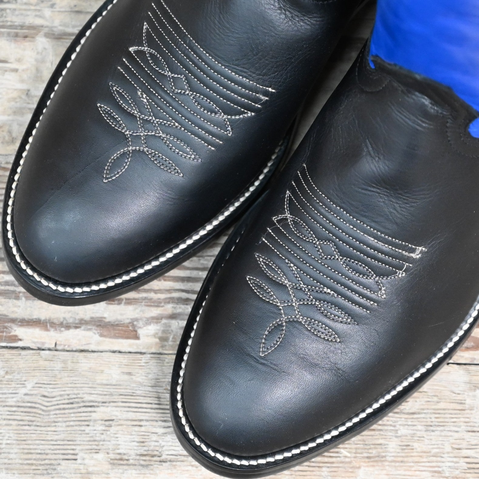 View of Hondo 16" cowboy boot with royal blue top, black retan vamp, pull holes, and medium round toe