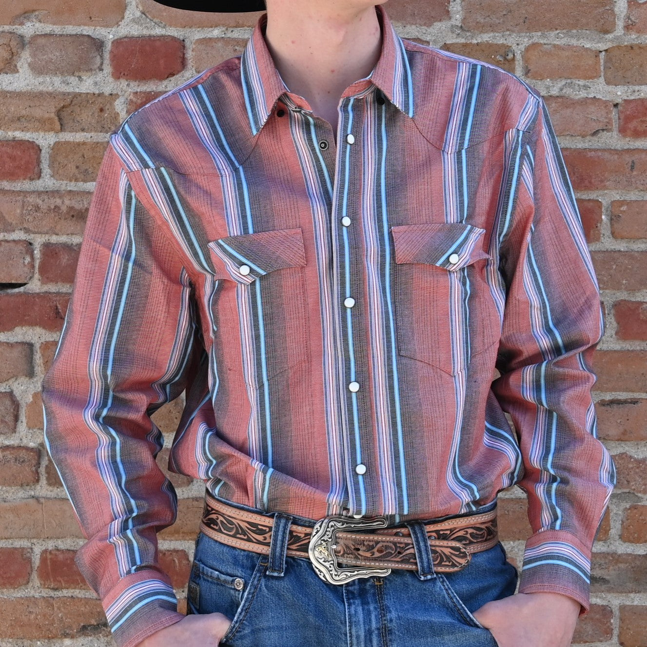 View of Schaefer Western snap shirt in assorted patterns with pearl snaps and vented back