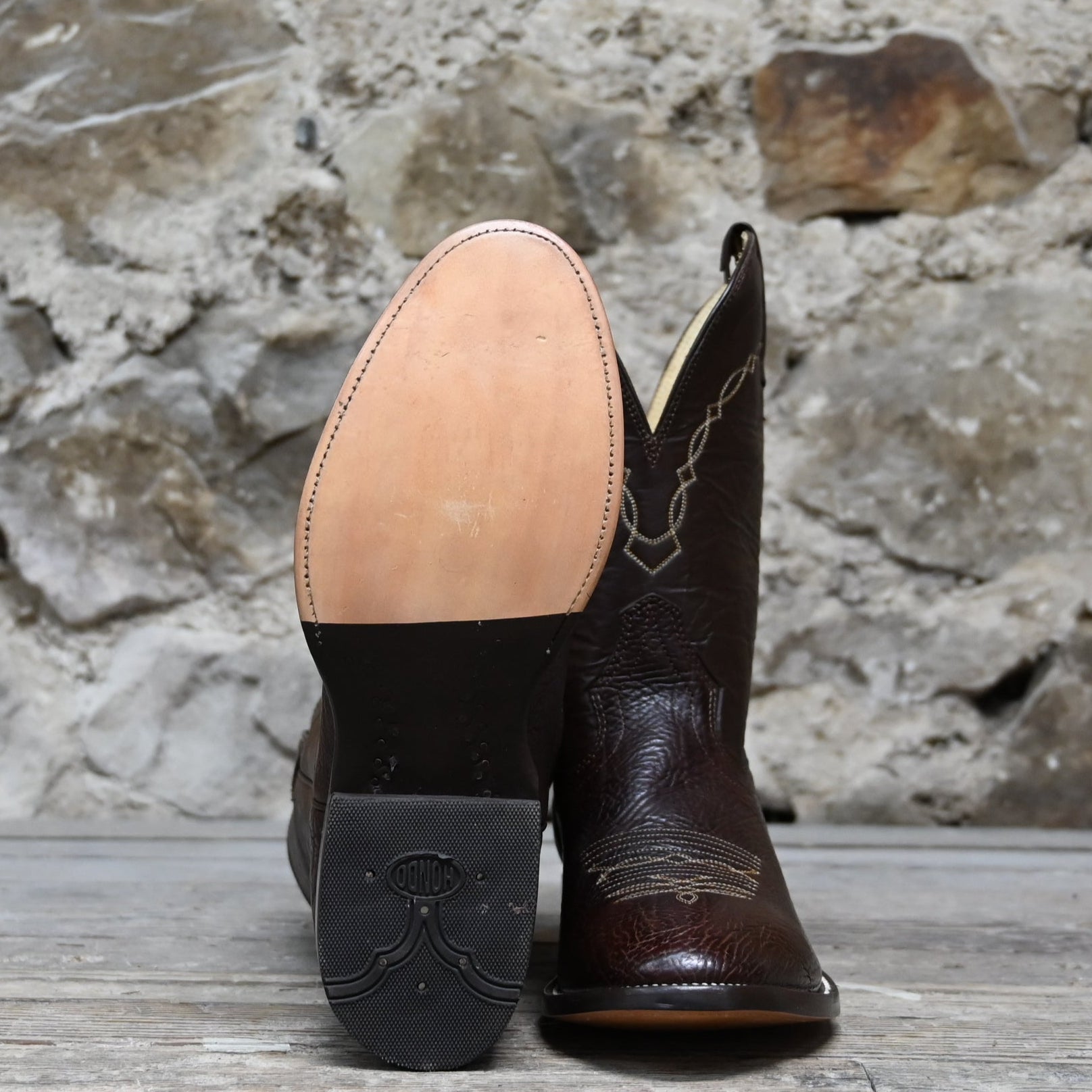 View of Hondo 11" cowboy boot with brown cowhide vamp, brown top, and medium round toe