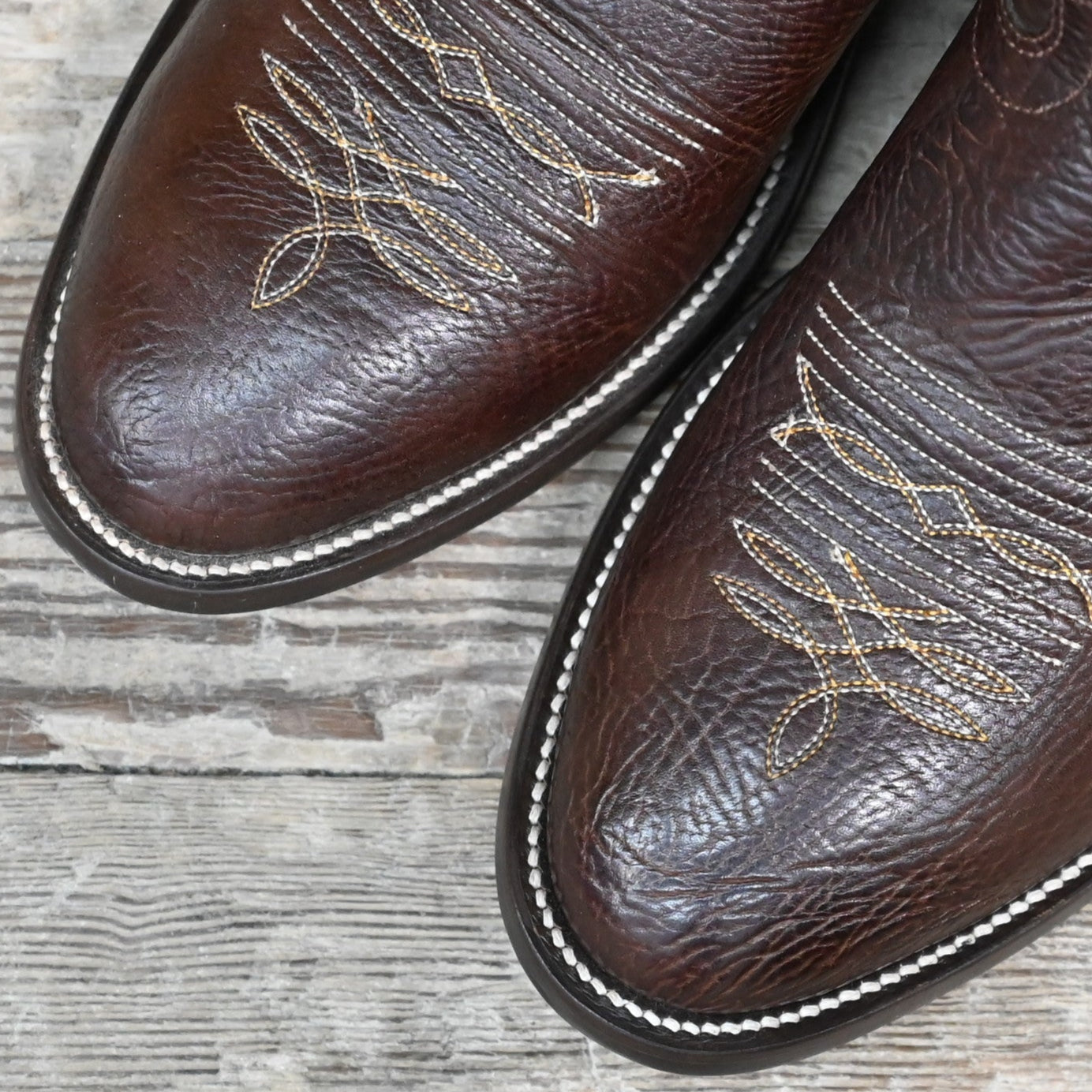 View of Hondo 11" cowboy boot with brown cowhide vamp, brown top, and medium round toe