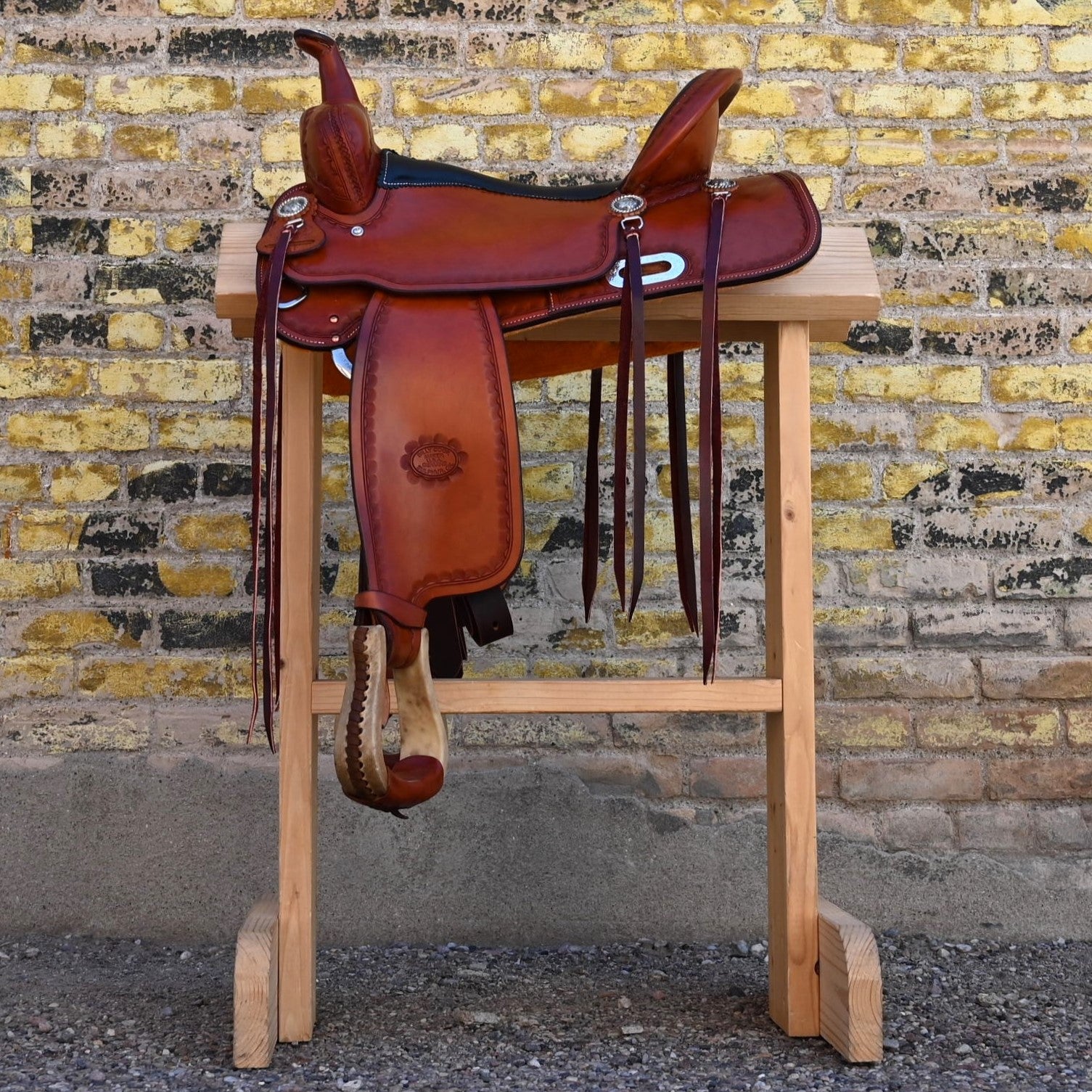 View of Billy Cook 16" Russet Trail Saddle with large camouflage border tooling