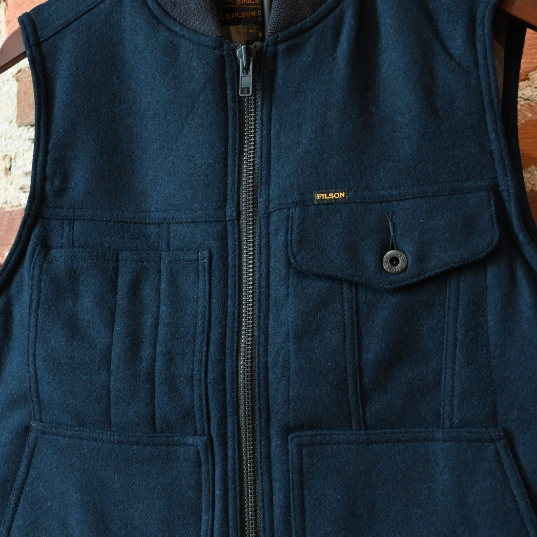 Filson Spokane insulated work vest in navy wool-blend with quilted insulation and utility pockets