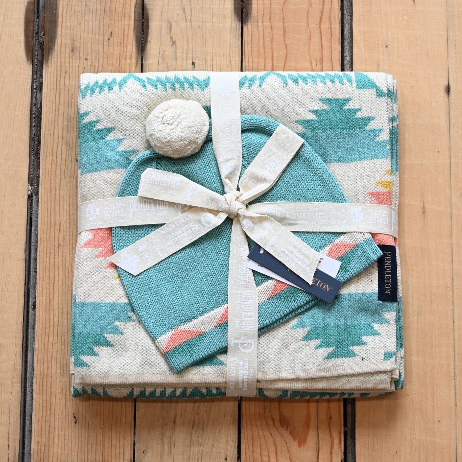 View of Pendleton knit baby blanket and beanie set in Falcon Cove Tan pattern